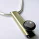 Image for article titled Precious Metal Cover Makes Jewelry of Apple Bluetooth Headset
